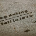 a close up of a piece of paper with writing on it